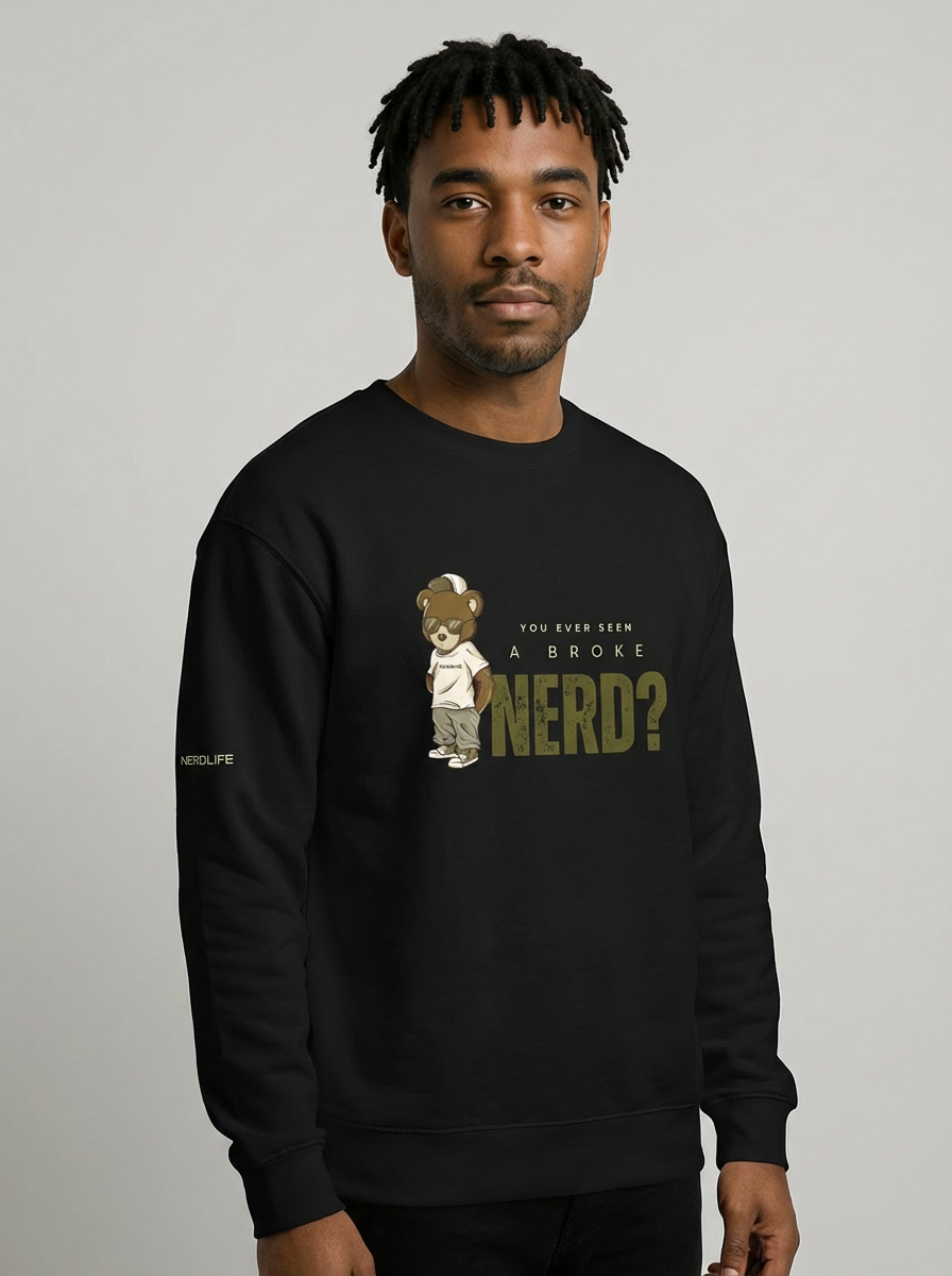 Man wearing a black sweatshirt with a graphic and text on a plain background